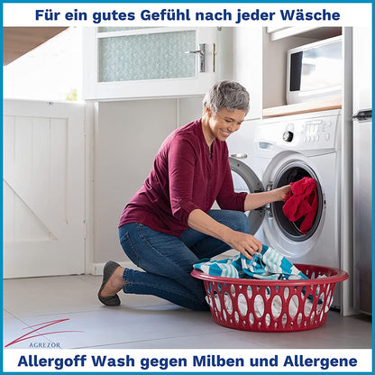 Frau entnimmt frische Wäsche aus der Waschmaschine als Symbol für Allergoff Wash zur Entfernung von Milben und Allergenen aus Textilien